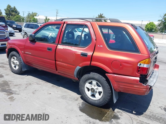 1999 Isuzu Rodeo S z VIN 4S2CK58W4X4362837, wystawiony jako IAAI lot #42403621 z przebiegiem 177 690 mil mil oraz . Historia ofert i sprzedaży dostępna na DreamBid. Obrazek 3.