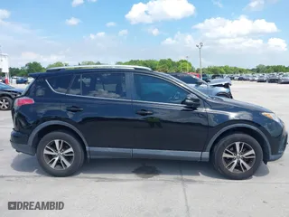 2016 Toyota RAV4 XLE with VIN 2T3WFREV4GW294428, listed as a IAAI auction lot 39168618 with 115,791 mi miles. Bid and sale history available at carsss.com. Image 13.