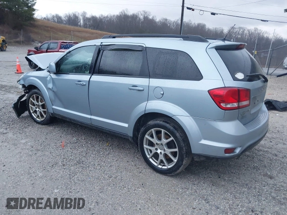 2013 Dodge Journey SXT with VIN 3C4PDDBG2DT579358, listed as a IAAI auction lot 41546005 with 167,489 mi miles and . Bid and sale history available at DreamBid. Image 3.