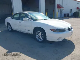 2003 Pontiac Grand Prix SE z VIN 1G2WK52J93F126127, wystawiony jako IAAI lot #42078346 z przebiegiem 236 183 mil mil oraz . Historia ofert i sprzedaży dostępna na DreamBid. Obrazek 1.