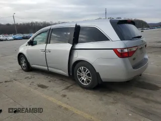 2012 Honda Odyssey EX-L with VIN 5FNRL5H60CB117376, listed as a Copart auction lot 50740725 with 163,716 mi miles and Salvage Title. Bid and sale history available at DreamBid. Image 2.