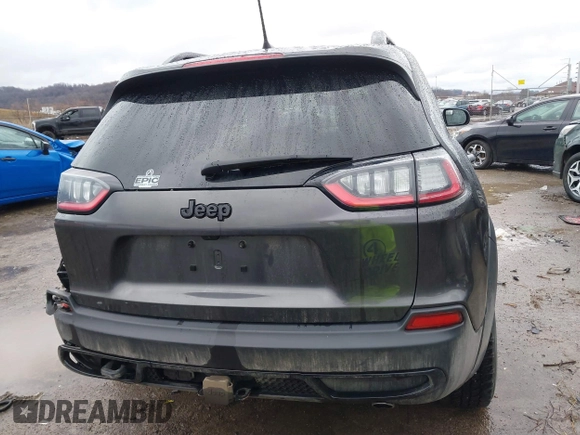 2022 Jeep Cherokee X with VIN 1C4PJMCX4ND525297, listed as a IAAI auction lot 41519912 with 42,691 mi miles. Bid and sale history available at carsss.com. Image 16.