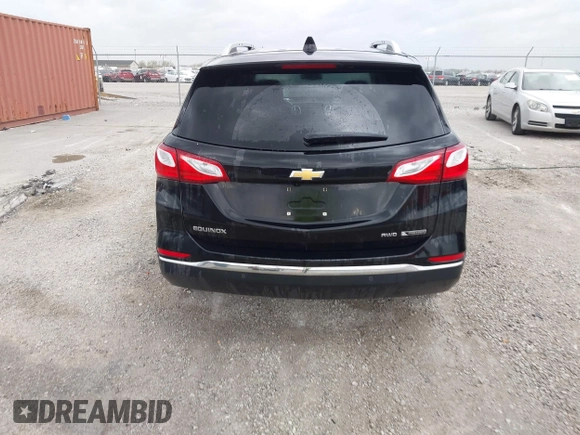 2018 Chevrolet Equinox Premier with VIN 2GNAXVEV7J6275379, listed as a IAAI auction lot 41949962 with 149,329 mi miles and . Bid and sale history available at DreamBid. Image 16.