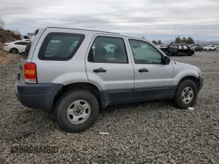 2004 Ford Escape XLS with VIN 1FMYU92194KA15099, listed as a Copart auction lot 47258535 with 147,409 mi miles and Clean Title. Bid and sale history available at DreamBid. Image 3.