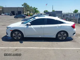 2016 Honda Civic EX-L z VIN 2HGFC1F83GH636374, wystawiony jako IAAI lot #42328432 z przebiegiem 130 738 mil mil oraz . Historia ofert i sprzedaży dostępna na DreamBid. Obrazek 14.