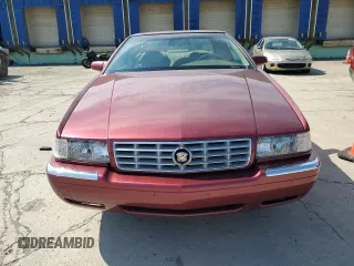 1997 Cadillac Eldorado ESC z VIN 1G6EL12Y5VU614955, wystawiony jako Copart lot #56222345 z przebiegiem 62 030 mil mil oraz Tytuł czysty. Historia ofert i sprzedaży dostępna na DreamBid. Obrazek 5.
