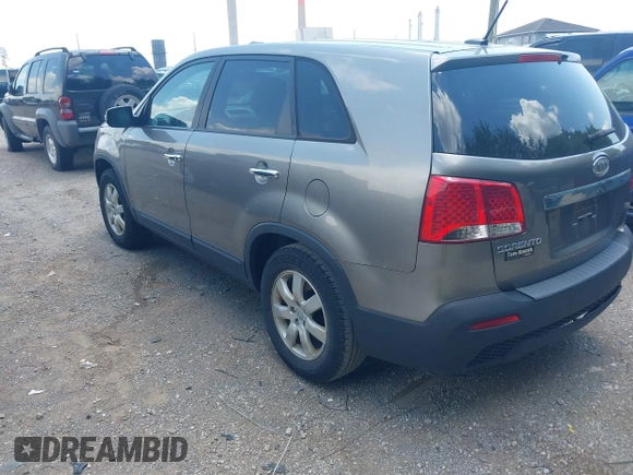 2013 Kia Sorento LX with VIN 5XYKT3A17DG405636, listed as a IAAI auction lot 42595956 with 192,632 mi miles and . Bid and sale history available at DreamBid. Image 3.