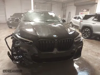 2021 BMW X6 xDrive40i with VIN 5UXCY6C03M9E61703, listed as a IAAI auction lot 41602401 with 1 mi miles. Bid and sale history available at carsss.com. Image 12.