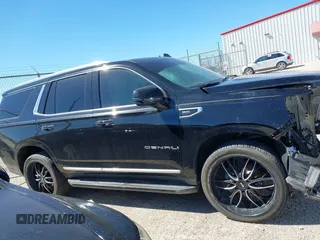 2021 GMC Yukon Denali with VIN 1GKS2DKL3MR409536, listed as a IAAI auction lot 41728940 with 62,244 mi miles. Bid and sale history available at carsss.com. Image 13.