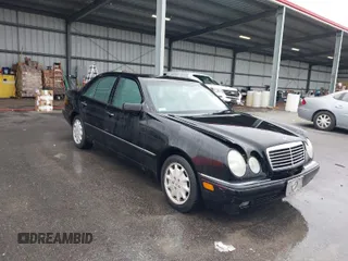 1996 Mercedes-Benz E-Class with VIN WDBJF55F0TJ007170, listed as a IAAI auction lot 41147514 with 122,044 mi miles. Bid and sale history available at carsss.com. Image 1.