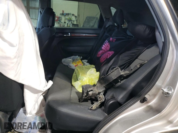 2013 Kia Sorento LX z VIN 5XYKT3A62DG348239, wystawiony jako Copart lot #52022165 z przebiegiem Nie podano mil oraz Szkoda całkowita • Salvage title. Historia ofert i sprzedaży dostępna na DreamBid. Obrazek 11.