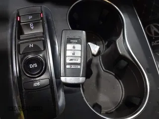 2016 Acura MDX w/Tech with VIN 5FRYD4H40GB017297, listed as a IAAI auction lot 41899975 with 95,757 mi miles. Bid and sale history available at carsss.com. Image 11.