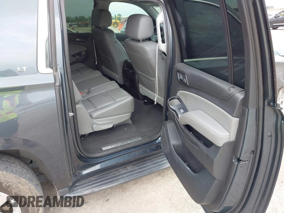 2020 Chevrolet Suburban LT z VIN 1GNSKHKC2LR259315, wystawiony jako IAAI lot #42129791 z przebiegiem 72 979 mil mil oraz . Historia ofert i sprzedaży dostępna na DreamBid. Obrazek 8.