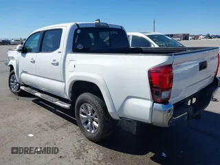 2018 Toyota Tacoma SR5 with VIN 5TFAZ5CN4JX056465, listed as a IAAI auction lot 41767848 with 71,532 mi miles and . Bid and sale history available at DreamBid. Image 3.