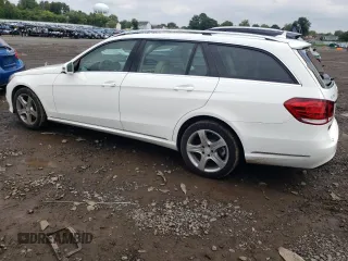 2014 Mercedes-Benz E 350 Luxury with VIN WDDHH8JBXEA803917, listed as a Copart auction lot 80199464 with 108,800 mi miles and Salvage Title. Bid and sale history available at DreamBid. Image 2.