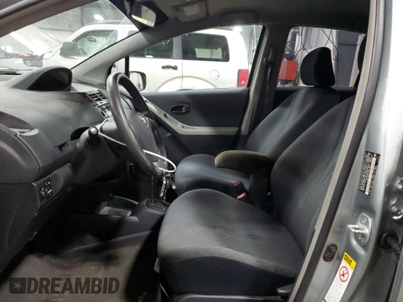 2009 Toyota Yaris with VIN JTDKT903X95231860, listed as a Copart auction lot 51908185 with 135,701 mi miles and Salvage Title. Bid and sale history available at carsss.com. Image 7.