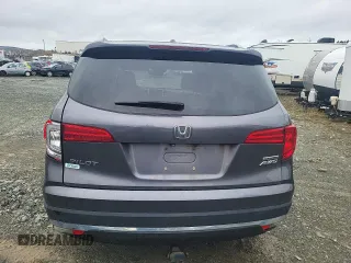 2018 Honda Pilot Touring z VIN 5FNYF6H93JB500695, wystawiony jako Copart lot #83302284 z przebiegiem 12 086 mil mil oraz Szkoda całkowita • Salvage title. Historia ofert i sprzedaży dostępna na DreamBid. Obrazek 6.