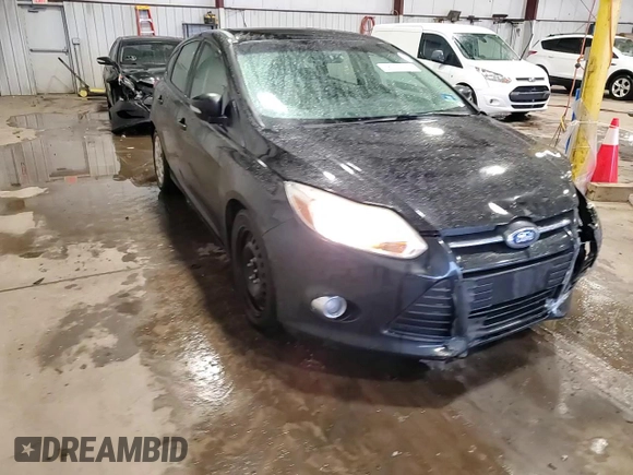 2012 Ford Focus SE z VIN 1FAHP3K24CL407570, wystawiony jako Copart lot #56002135 z przebiegiem 122 730 mil mil oraz Szkoda całkowita • Salvage title. Historia ofert i sprzedaży dostępna na DreamBid. Obrazek 14.