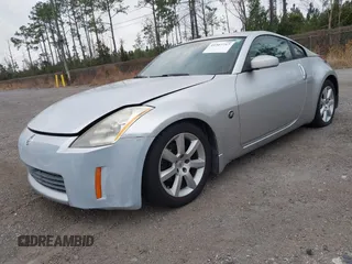 2003 Nissan 350Z Touring z VIN JN1AZ34E13T007885, wystawiony jako IAAI lot #41567717 z przebiegiem 149 279 mil mil oraz . Historia ofert i sprzedaży dostępna na DreamBid. Obrazek 2.