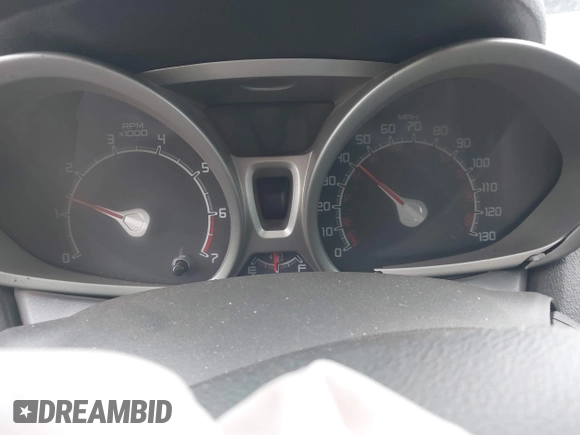 2012 Ford Fiesta SE with VIN 3FADP4BJ2CM115295, listed as a IAAI auction lot 41609949 with Not Provided miles. Bid and sale history available at carsss.com. Image 7.