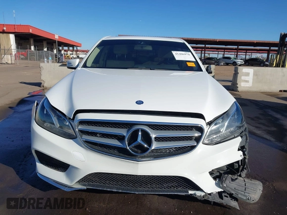 2014 Mercedes-Benz E-Class E 250 BlueTEC Luxury with VIN WDDHF0EB1EA873470, listed as a IAAI auction lot 41406978 with 98,515 mi miles. Bid and sale history available at carsss.com. Image 13.