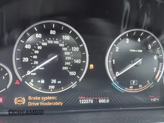 2014 BMW X5 xDrive50i with VIN 5UXKR6C54E0C02423, listed as a IAAI auction lot 42278044 with 122,370 mi miles and . Bid and sale history available at DreamBid. Image 7.