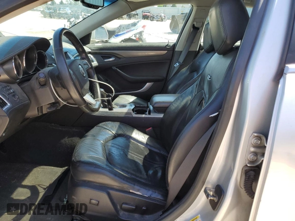 2009 Cadillac CTS AWD with VIN 1G6DG577690170912, listed as a Copart auction lot 56020815 with 142,932 mi miles and Clean Title. Bid and sale history available at DreamBid. Image 7.