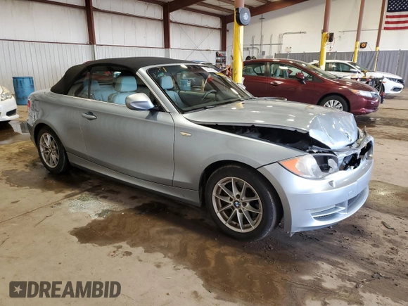 2011 BMW 1 Series 128i with VIN WBAUL7C57BVM80274, listed as a Copart auction lot 52127595 with 104,952 mi miles and Salvage title. Bid and sale history available at DreamBid. Image 4.