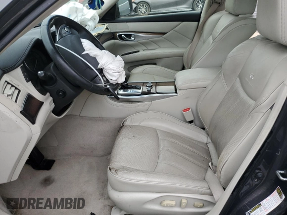 2012 Infiniti M with VIN JN1BY1AR2CM394976, listed as a Copart auction lot 61064205 with 170,108 mi miles and Salvage title. Bid and sale history available at DreamBid. Image 7.