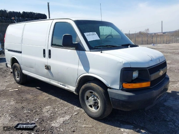 2012 Chevrolet Express Cargo Van with VIN 1GCWGFCAXC1141962, listed as a IAAI auction lot 41833413 with 221,350 mi miles. Bid and sale history available at carsss.com. Image 1.