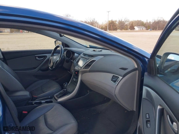 2014 Hyundai Elantra SE with VIN KMHDH4AE6EU130694, listed as a IAAI auction lot 41696190 with 121,588 mi miles. Bid and sale history available at carsss.com. Image 5.
