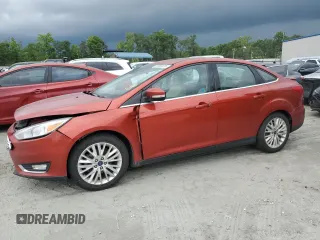 2018 Ford Focus Titanium with VIN 1FADP3J26JL284299, listed as a Copart auction lot 58908325 with 79,331 mi miles and Salvage title. Bid and sale history available at DreamBid. Image 1.