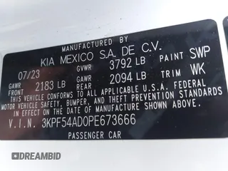 2023 Kia Forte GT-Line z VIN 3KPF54AD0PE673666, wystawiony jako IAAI lot #41242873 z przebiegiem 24 075 mil mil oraz . Historia ofert i sprzedaży dostępna na DreamBid. Obrazek 9.