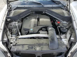 2014 BMW X6 xDrive35i z VIN 5UXFG2C53E0C42900, wystawiony jako Copart lot #55641745 z przebiegiem 156 045 mil mil oraz Tytuł czysty. Historia ofert i sprzedaży dostępna na DreamBid. Obrazek 12.