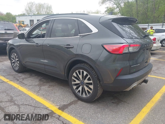 2020 Ford Escape Titanium with VIN 1FMCU9J96LUA00564, listed as a IAAI auction lot 42261152 with 73,748 mi miles and . Bid and sale history available at DreamBid. Image 3.