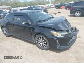 2015 Scion tC z VIN JTKJF5C75FJ012021, wystawiony jako IAAI lot #42143878 z przebiegiem 127 235 mil mil oraz . Historia ofert i sprzedaży dostępna na DreamBid. Obrazek 1.