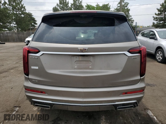 2022 Cadillac XT6 Premium Luxury with VIN 1GYKPDRS5NZ180296, listed as a Copart auction lot 59081184 with 21,380 mi miles and Salvage title. Bid and sale history available at DreamBid. Image 6.