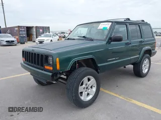 1999 Jeep Cherokee Sport z VIN 1J4FT68S1XL667138, wystawiony jako IAAI lot #42651020 z przebiegiem 200 324 mil mil oraz . Historia ofert i sprzedaży dostępna na DreamBid. Obrazek 2.