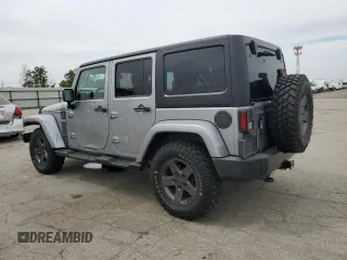 2016 Jeep Wrangler Unlimited Sport z VIN 1C4BJWDG5GL179046, wystawiony jako Copart lot #52989725 z przebiegiem 129 051 mil mil oraz Szkoda całkowita • Salvage title. Historia ofert i sprzedaży dostępna na DreamBid. Obrazek 2.