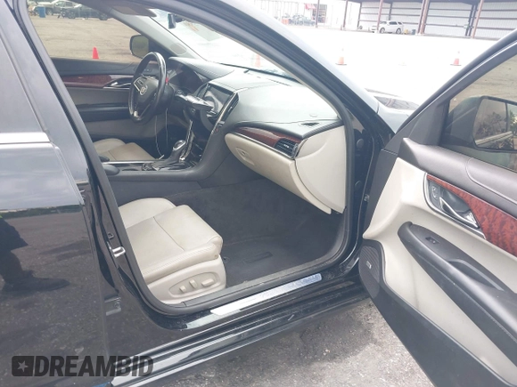 2014 Cadillac ATS Luxury AWD with VIN 1G6AH5RX5E0105296, listed as a IAAI auction lot 42534349 with 219,887 mi miles and . Bid and sale history available at DreamBid. Image 5.