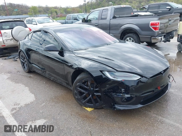 2022 Tesla Model S Plaid with VIN 5YJSA1E60NF460244, listed as a IAAI auction lot 41996403 with Not provided miles and . Bid and sale history available at DreamBid. Image 1.