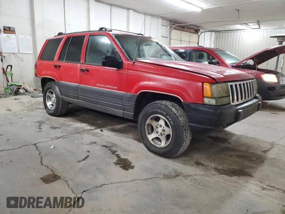 1997 Jeep Grand Cherokee Laredo with VIN 1J4GZ58Y9VC629994, listed as a Copart auction lot 83086694 with 252,147 mi miles and Salvage Title. Bid and sale history available at carsss.com. Image 4.
