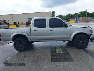2003 Toyota Tacoma PreRunner z VIN 5TEGN92N13Z295384, wystawiony jako IAAI lot #42406105 z przebiegiem 194 171 mil mil oraz . Historia ofert i sprzedaży dostępna na DreamBid. Obrazek 13.