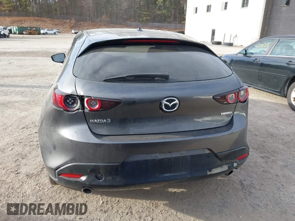 2021 Mazda 3 Premium with VIN JM1BPAML2M1310374, listed as a IAAI auction lot 41190608 with 97,648 mi miles and . Bid and sale history available at DreamBid. Image 16.