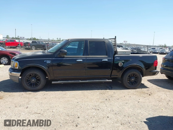 2003 Ford F-150 XLT with VIN 1FTRW07L43KB05221, listed as a IAAI auction lot 41762332 with 226,660 mi miles. Bid and sale history available at carsss.com. Image 14.