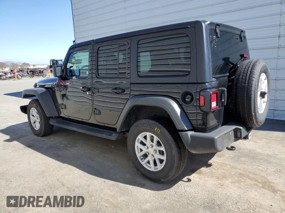 2023 Jeep Wrangler Sport with VIN 1C4HJXDNXPW701795, listed as a Copart auction lot 50451444 with 7,274 mi miles and Salvage Title. Bid and sale history available at DreamBid. Image 2.