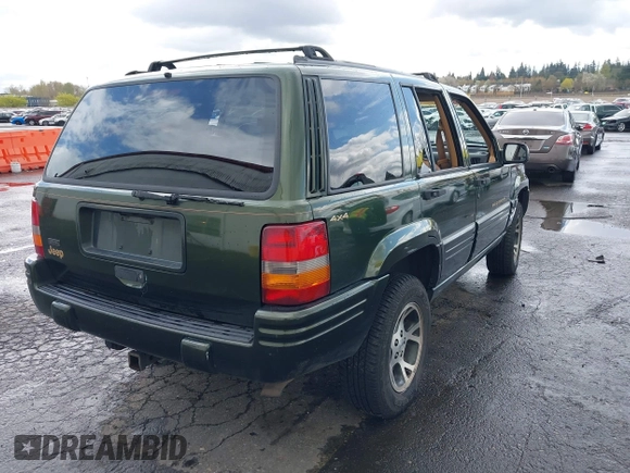 1996 Jeep Grand Cherokee Limited with VIN 1J4GZ78S0TC235692, listed as a IAAI auction lot 41945617 with Not provided miles and . Bid and sale history available at DreamBid. Image 4.