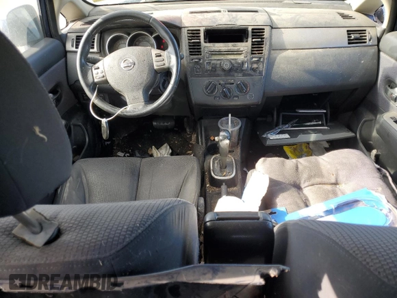 2009 Nissan Versa 1.8 S with VIN 3N1BC11E69L441683, listed as a Copart auction lot 43377925 with 111,958 mi miles and Salvage Title. Bid and sale history available at carsss.com. Image 8.