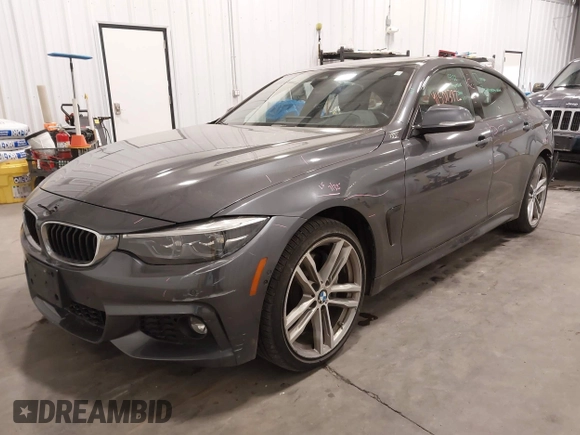 2018 BMW 4 Series 430i xDrive with VIN WBA4J3C52JBG95207, listed as a IAAI auction lot 41509392 with 68,193 mi miles and . Bid and sale history available at DreamBid. Image 2.