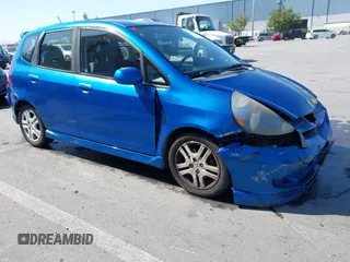 2007 Honda Fit Sport z VIN JHMGD386X7S028334, wystawiony jako IAAI lot #42034946 z przebiegiem 422 122 mil mil oraz . Historia ofert i sprzedaży dostępna na DreamBid. Obrazek 1.